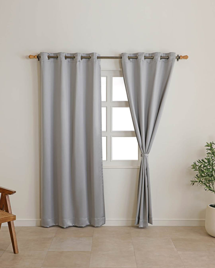 Solid pearl grey shade detail on 9 feet blackout curtain fabric