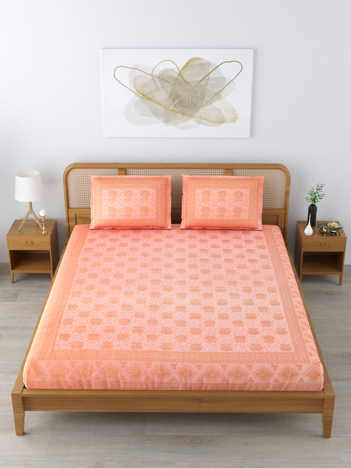 Cotton 250TC King Size Bedsheet With 2 Pillow Covers; Golden Motif On Bright Peach