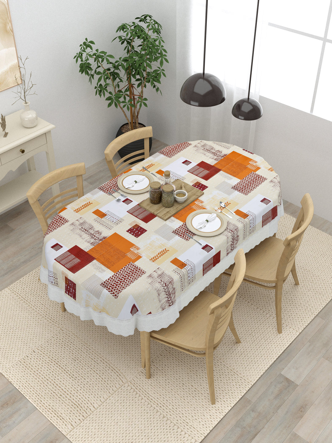 4 Seater Oval Dining Table Cover; 54x78 Inches; Material - PVC; Anti Slip; Orange & Maroon Checks