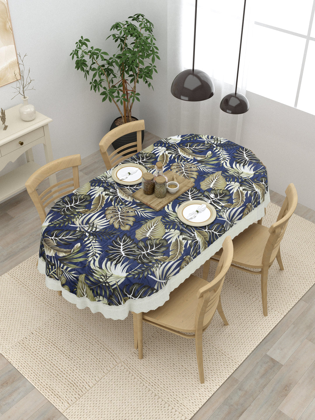 The Home Story  4 Seater Oval Dining Table Cover; 54x78 Inches; PVC; Blue Leaves