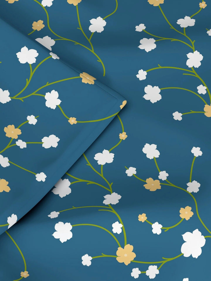 120 GSM All Weather Reversible Double Bed Quilt; 90x100 Inches; White & Yellow Small Flowers On Dark Blue Base